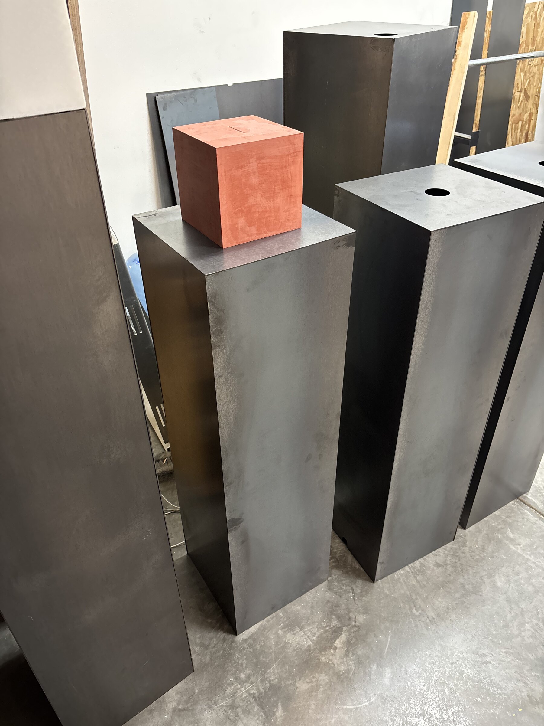 Interactive Elements — steel plinth with orange cube